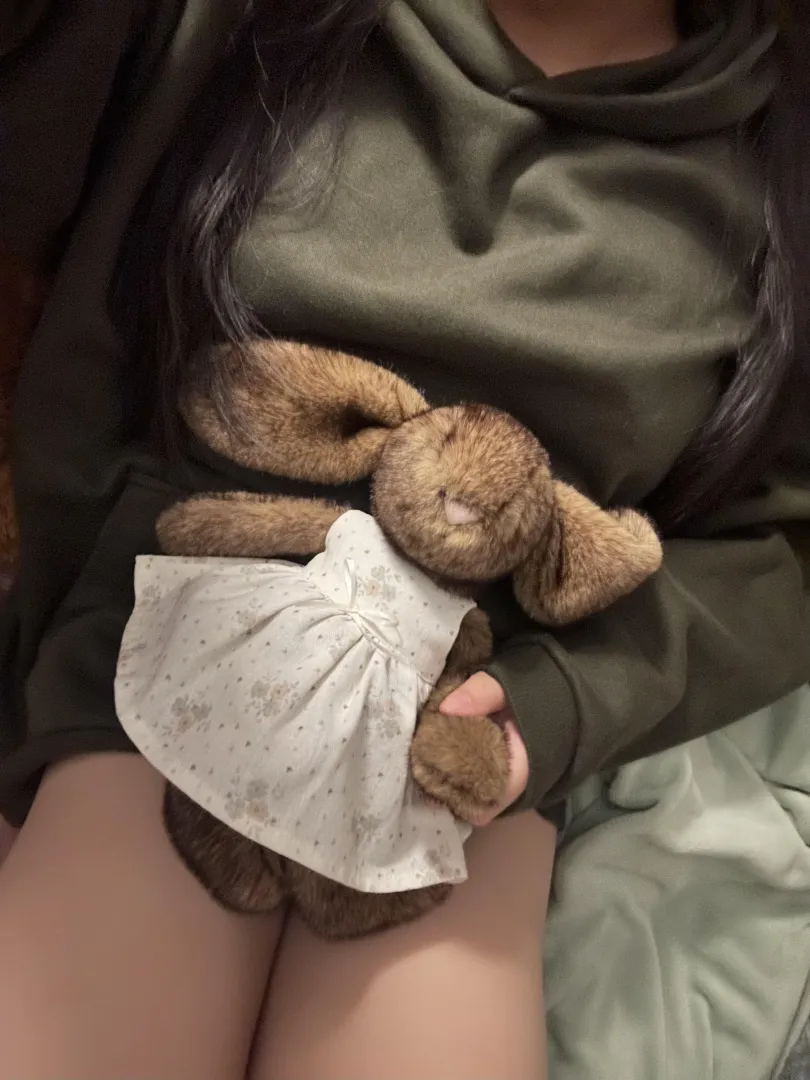 bby cuddles with new bunny :D