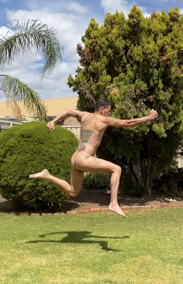 Naked in action during a workout