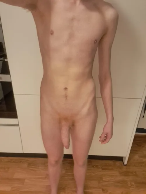 Naked in the kitchen