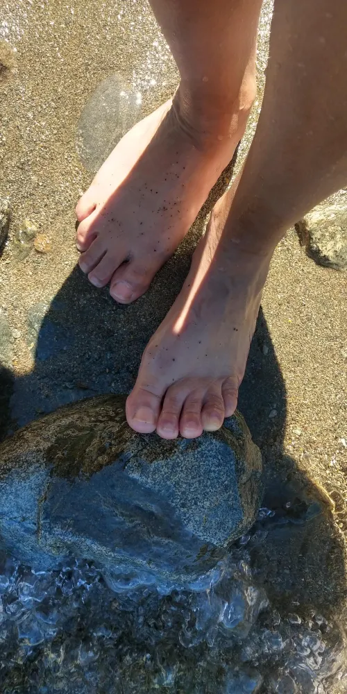 Barefoot ritual in cold water and stones . Size 35