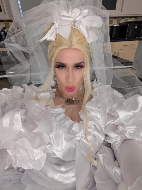 I got a cheeky Christmas bonus, so I splurged on an outrageous wedding dress...