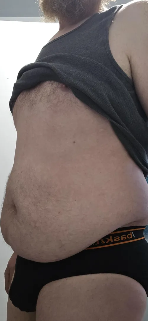 Age, 40. Getting ready for work.