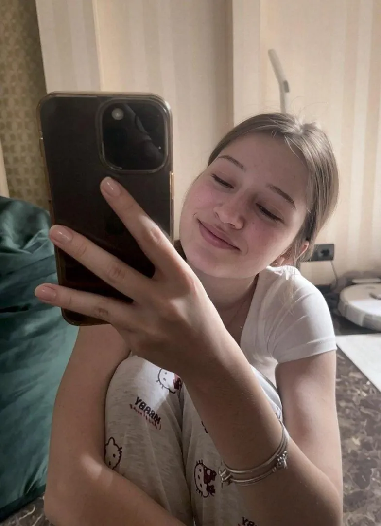 bored and quietly waiting.