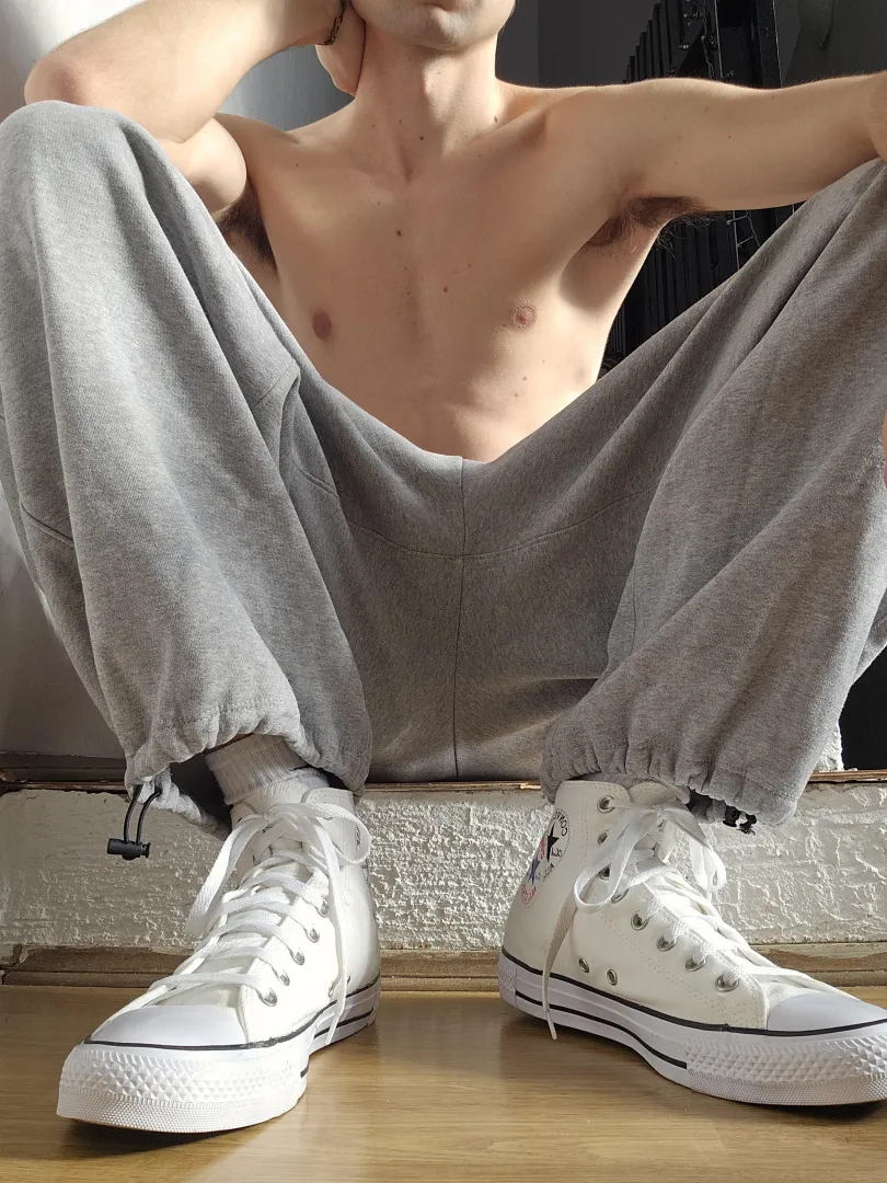 Grey sweats and white chucks are a killer combination