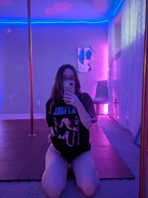 wearing an oversized T-shirt with sexy pics of myself on it 