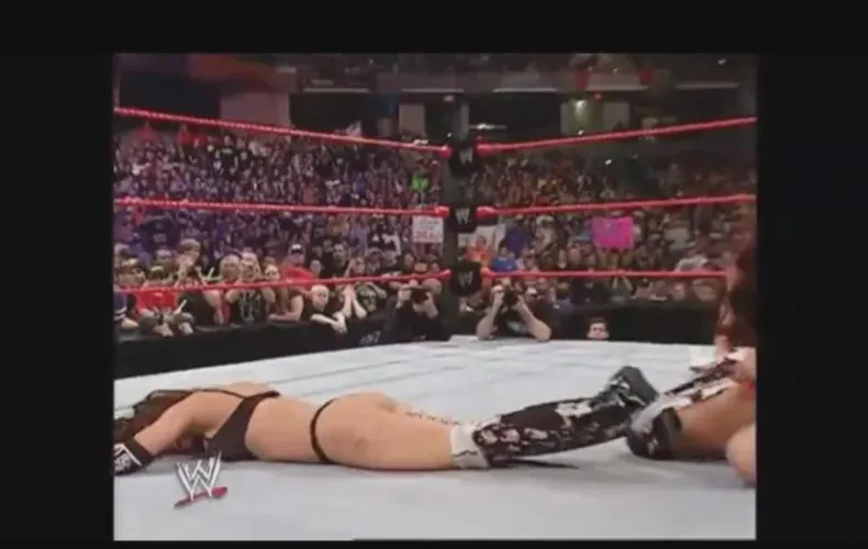 Candice Michelle out cold and stripped to her thong!!