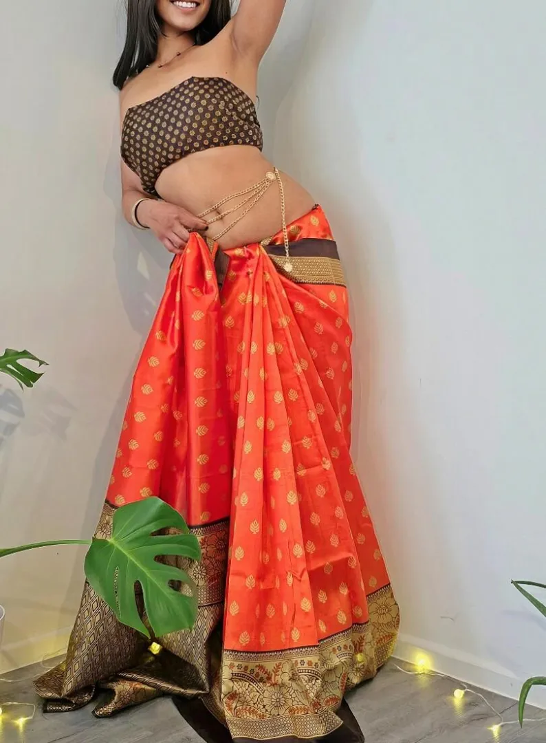 orange silk and a bare midriff.