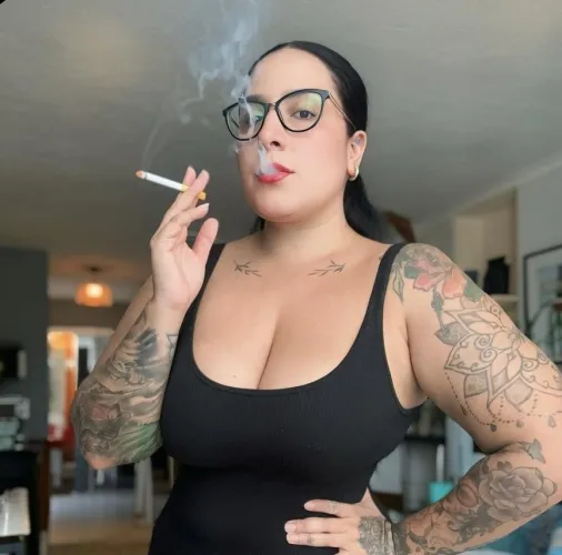 The soft sound of the drag, the slow smoke, my confident gaze… and you, completely captivated.