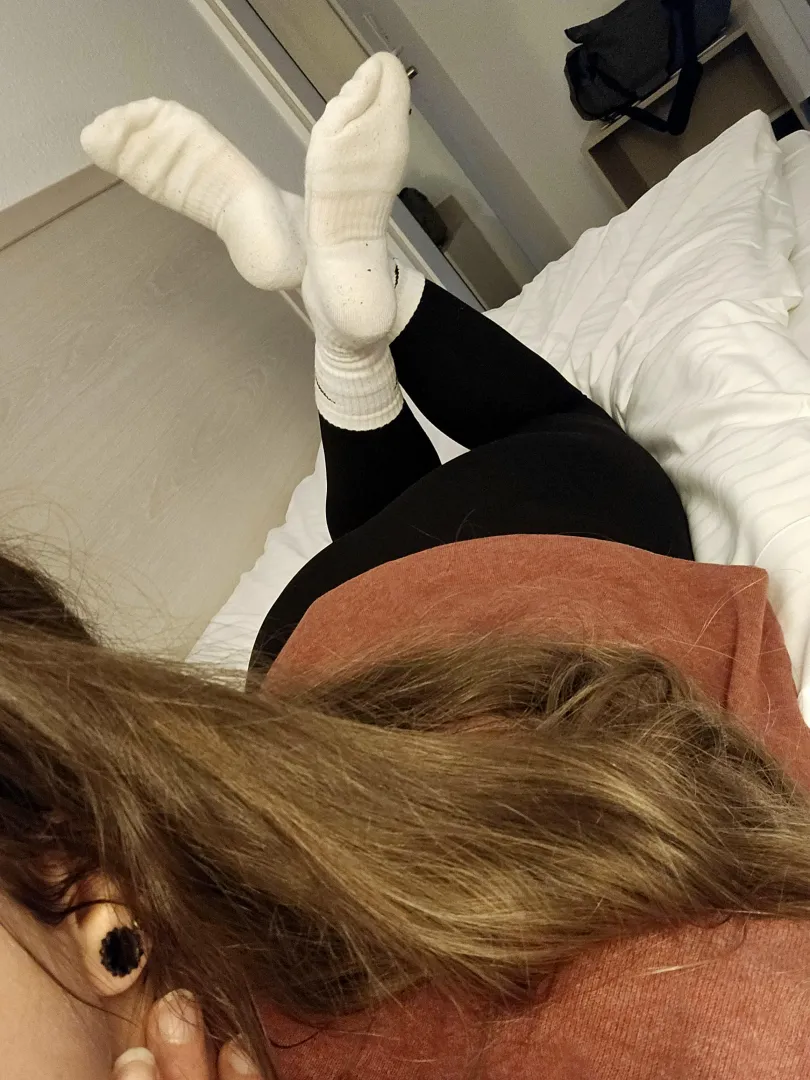 when she waits in the hotel room with her sweaty socks 
