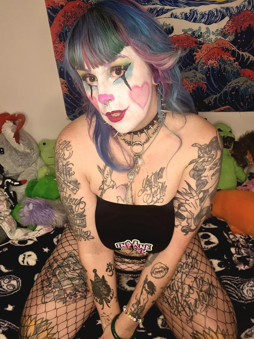 Tattooed, chubby, AND a clown??? 