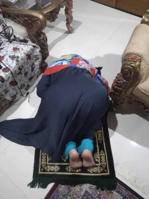 What do you feel when she bows down to pray?