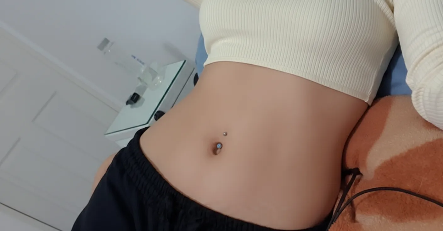 Outfit: cute. Navel ring: cuter. 