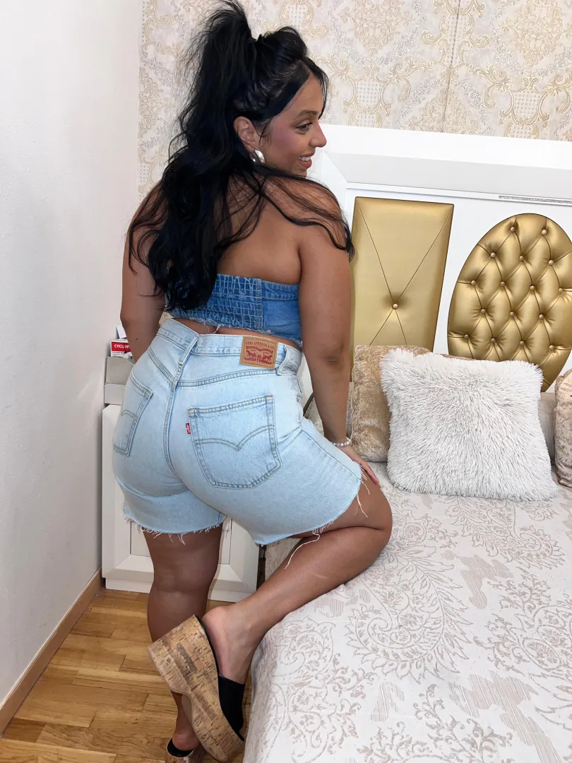 Tanned curves in denim radiating wild heat summers sexiest seaside glow