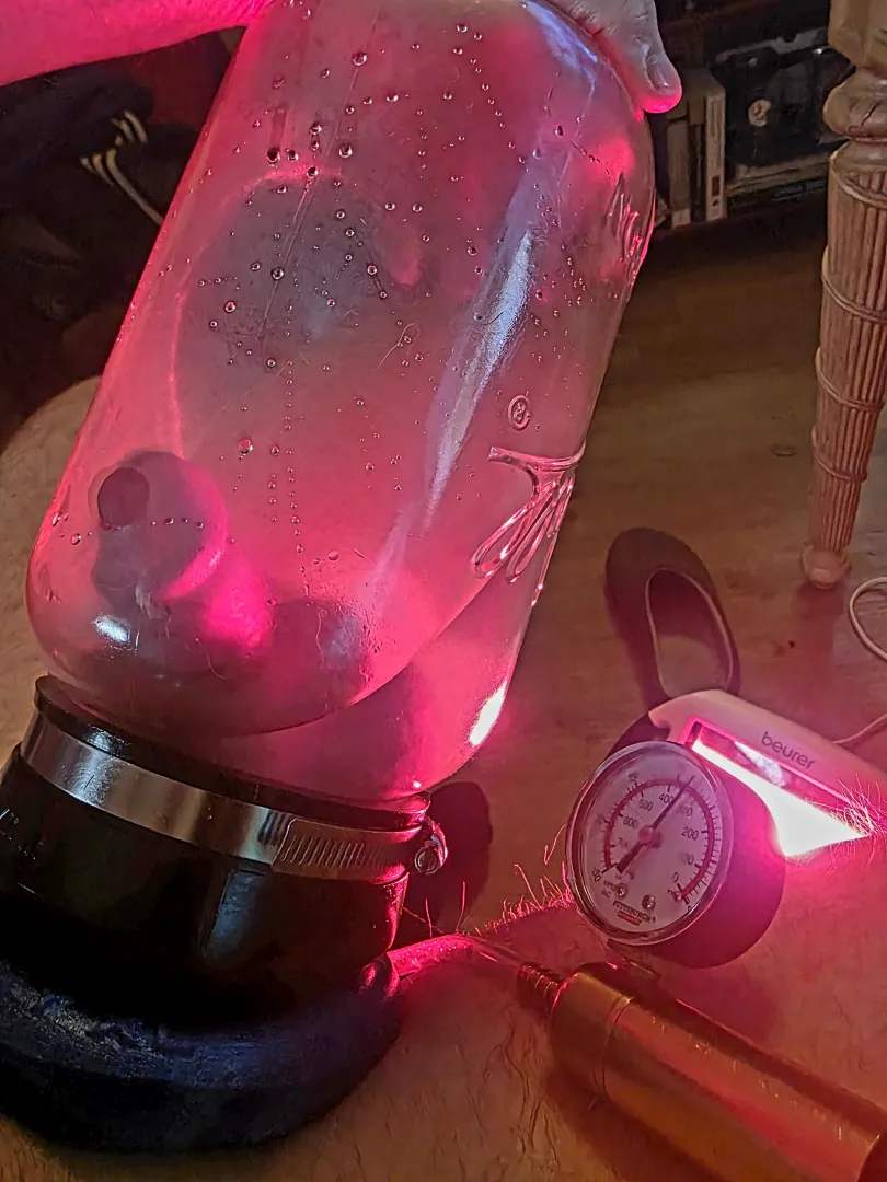 Pumping in my gallon Ball jar with epsom salt in warm water using an IR light vs. a heating pad.
