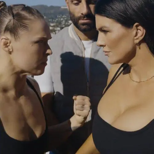 Ronda is angry at Gina for having bigger breasts