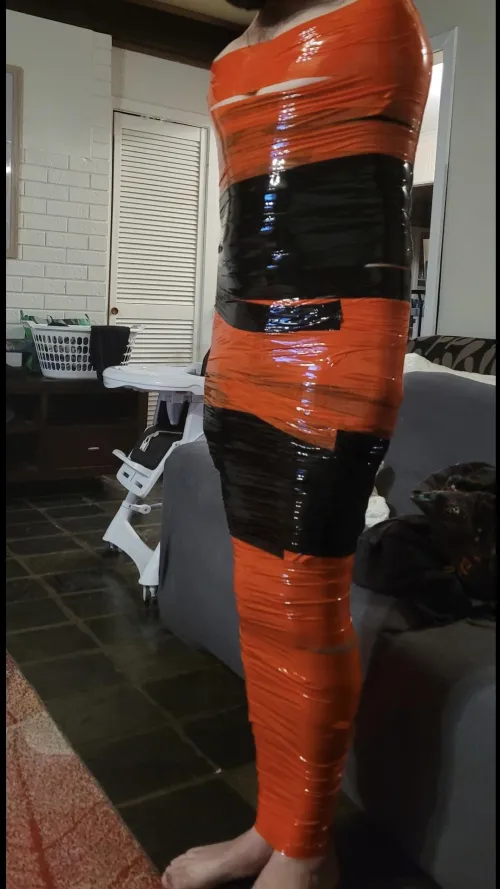 Mummified in pvc tape