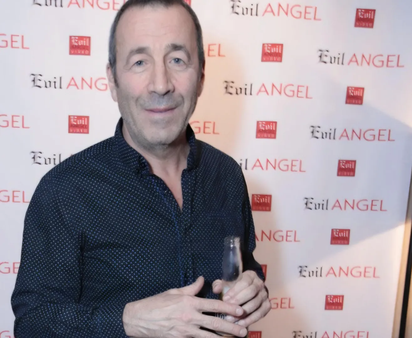 Why doesn't John Stagliano tell Mike Adriano about Joey Silvera's 