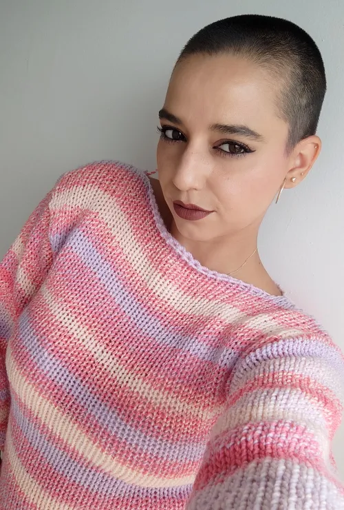 I'm not just a pretty face! I knit beautifully too! Admire my new handmade sweater and pay for it!!!