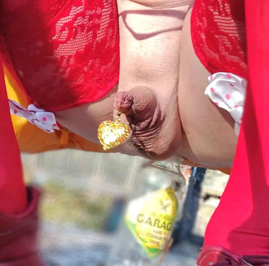 Sitting on a bottle with my limp clitty tied, am I good sissy?