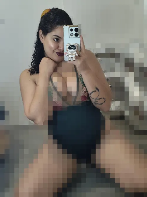 I have a very small pink thong, it makes me very horny to wear it, but you can't see it.