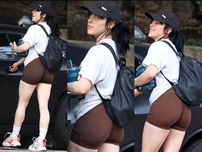 Billie rocks an X-rated illusion t-shirt and brown spandex shorts to the gym in Los Angeles - January 2023