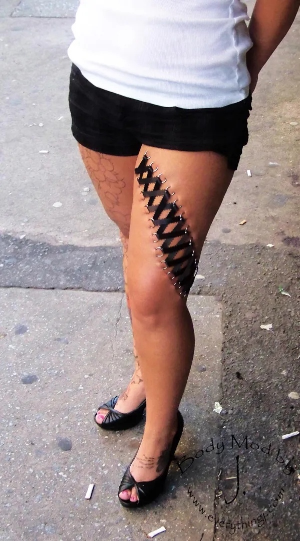 Leg corset piercing