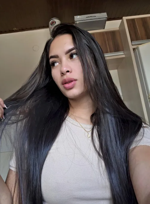 playing with my long dark hair...