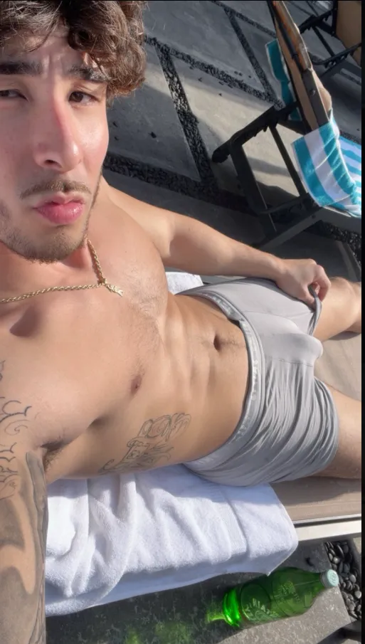 Sun, abs… and maybe a little extra showing