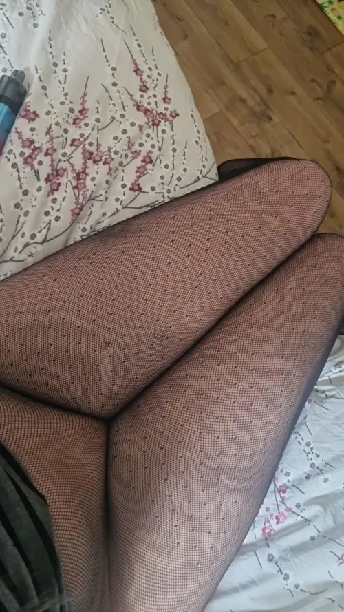 Earlier, she's in Nylons with no knickers.