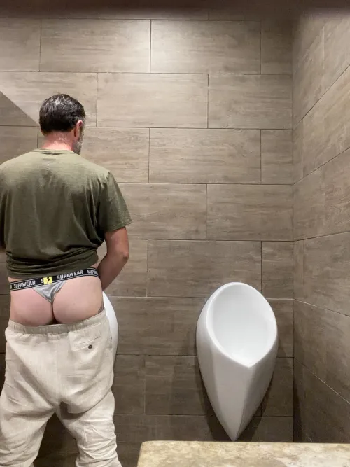 Just a straight guy in a thong..