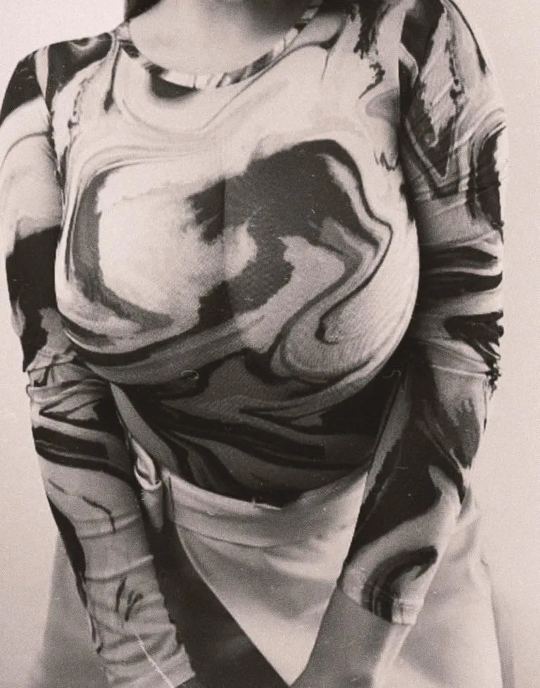 Be honest with me, can you make out that I’m not wearing a bra ?