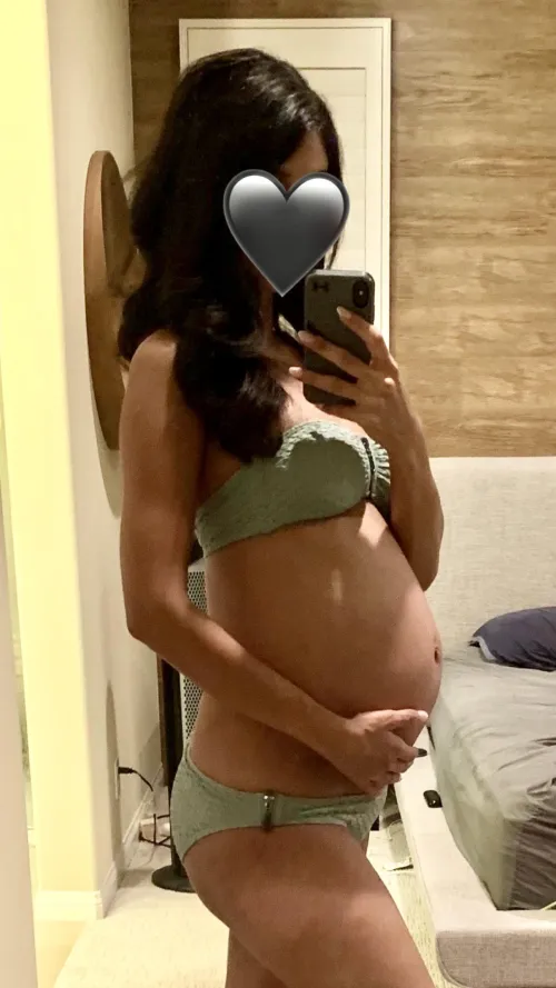 Pregnant but still petite. 8 month bump 