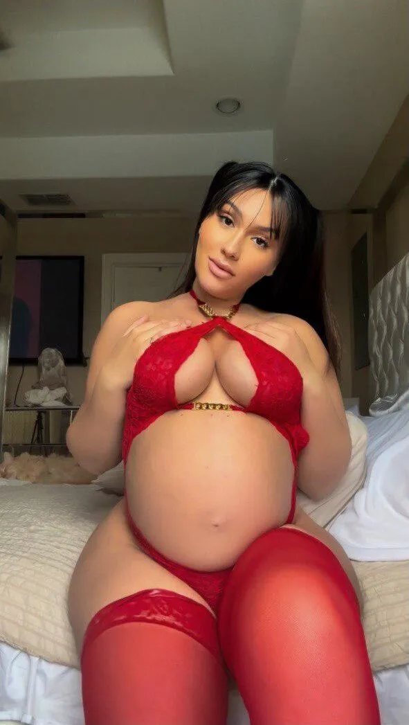 Who wants to worship this big, juicy pregnant belly up close?