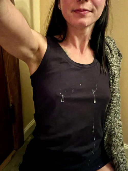 Cum against black clothes looks good