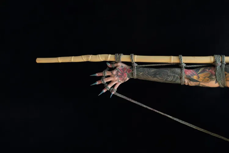 I've tied my left art to a bamboo stick with ogawa jute. What do you think of this selftie shibari?