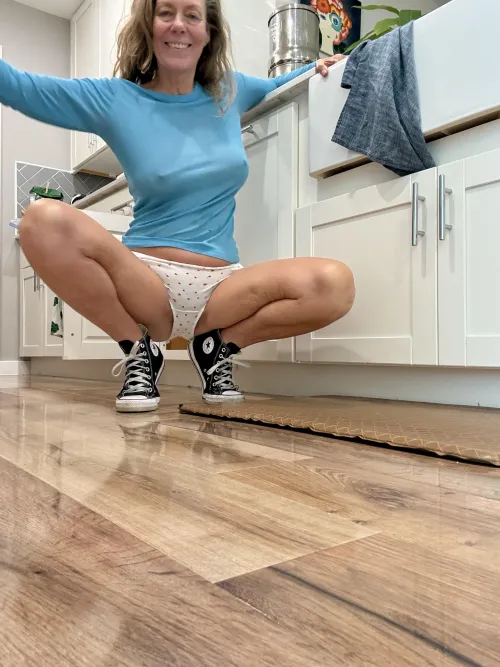 Wearing chucks around the house...because they're the best.  59yo.