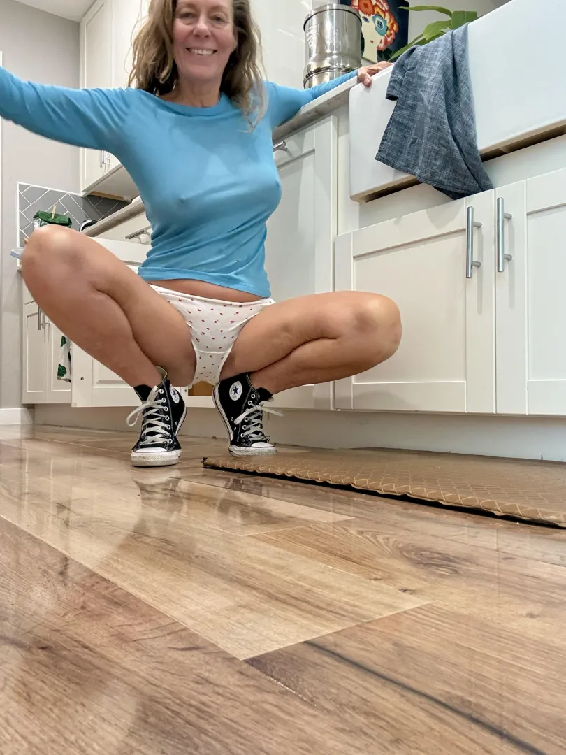 Wearing chucks around the house...because they're the best.  59yo.