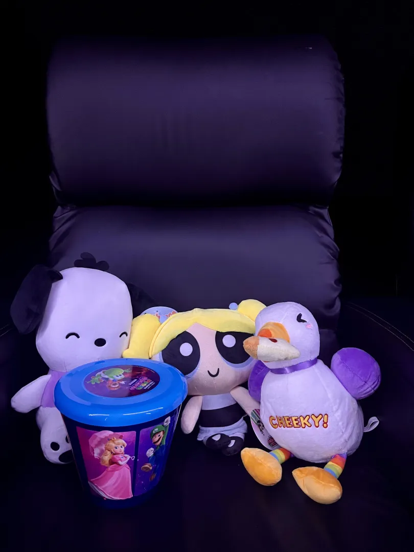 Daddy won me stuffies at the arcade and then took me to a movie  