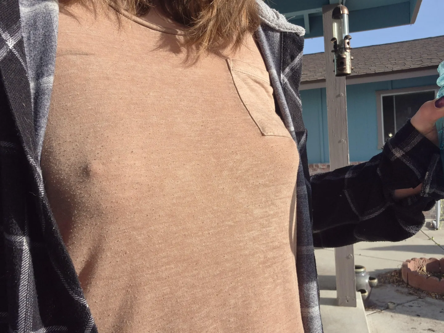 I think this shirt looks better without a bra