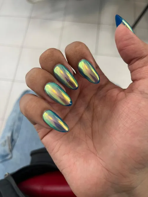 Blue chrome manicure