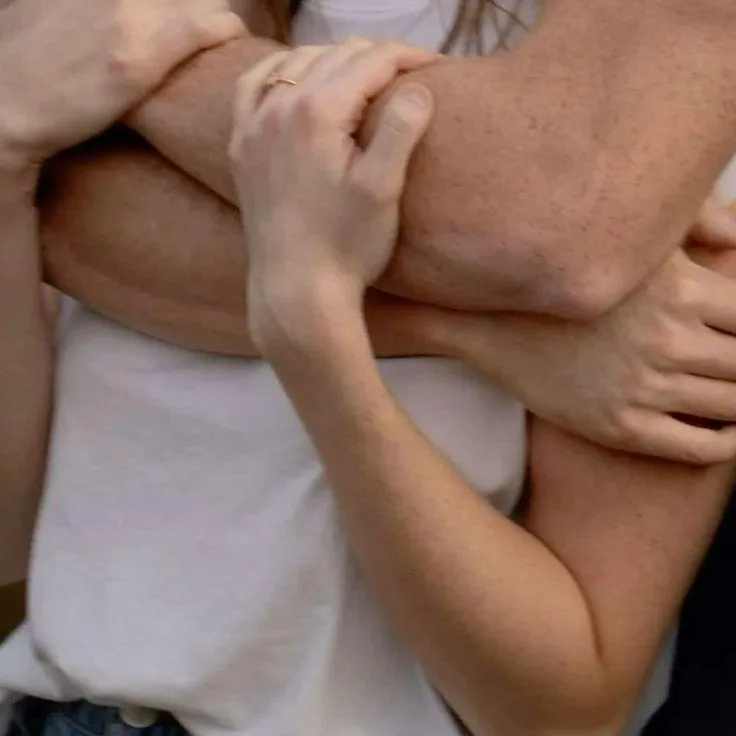 That wonderful hug from behind that only someone you love can deliver.