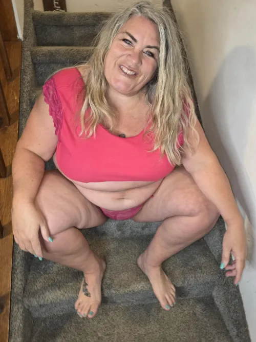 Thick thighs and blue eyes.