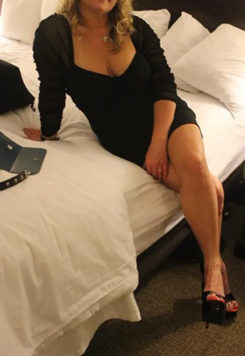 pic 1 - my wife in our hotel room after I dress her for her young lover, wearing our wedding ring patiently awaiting his arrival...Pic 2- her response, laughing at me, when I ask her if I will get to fuck her after she is done with his big cock  :)