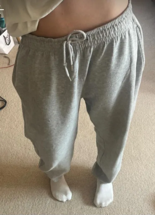 Just trying on some gray joggers.