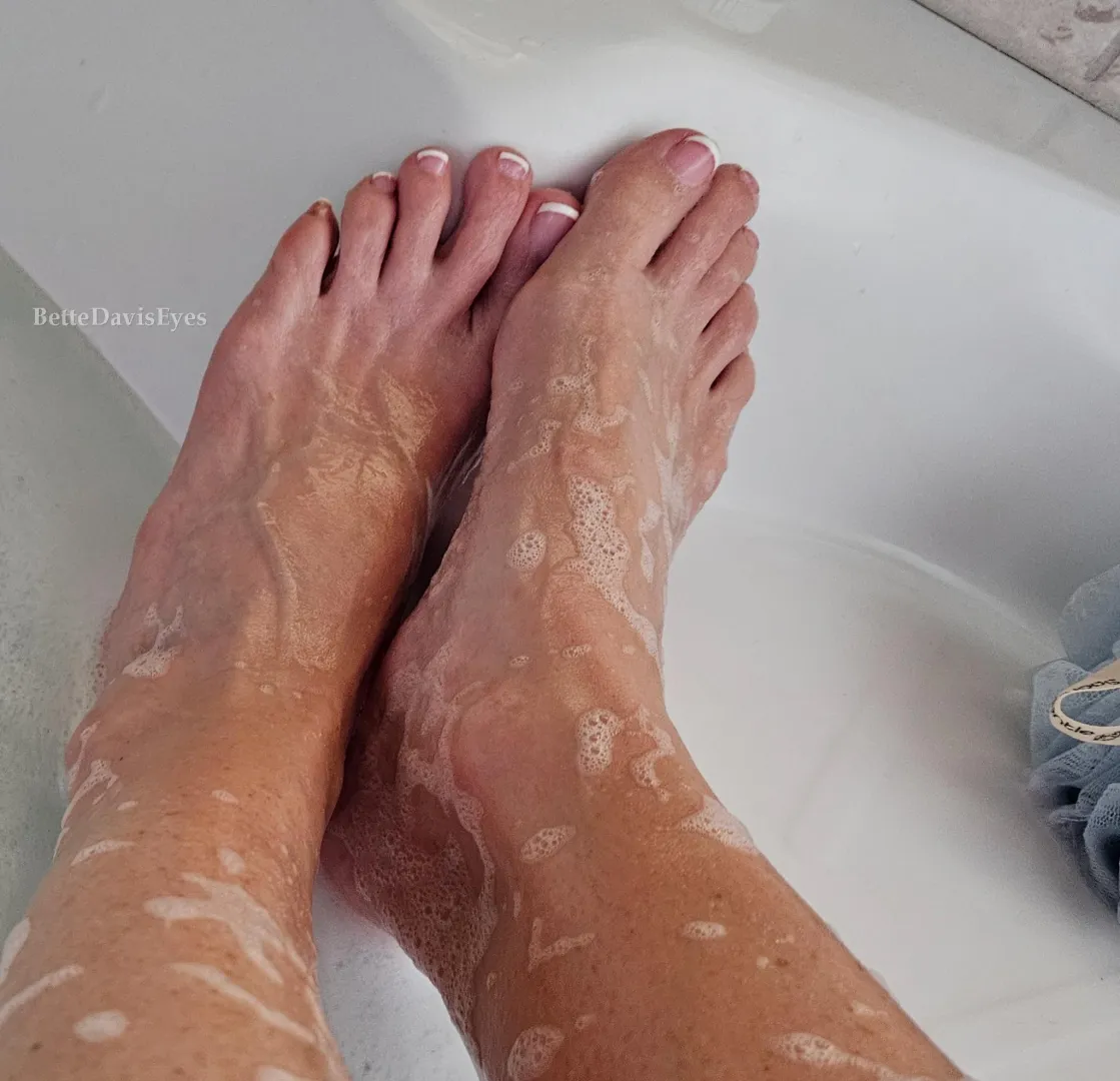 Warm water, soft bubbles & my feet resting together like they belong in your hands.