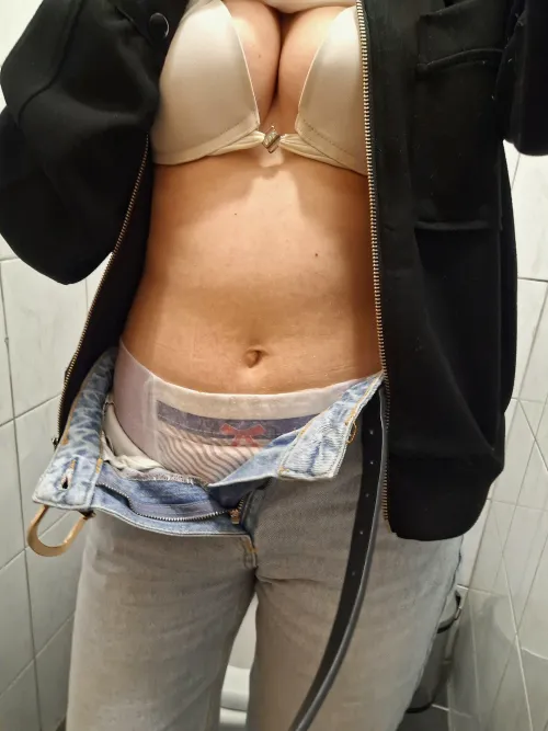 Risking it all in the office restroom. Hope no one walks in! 