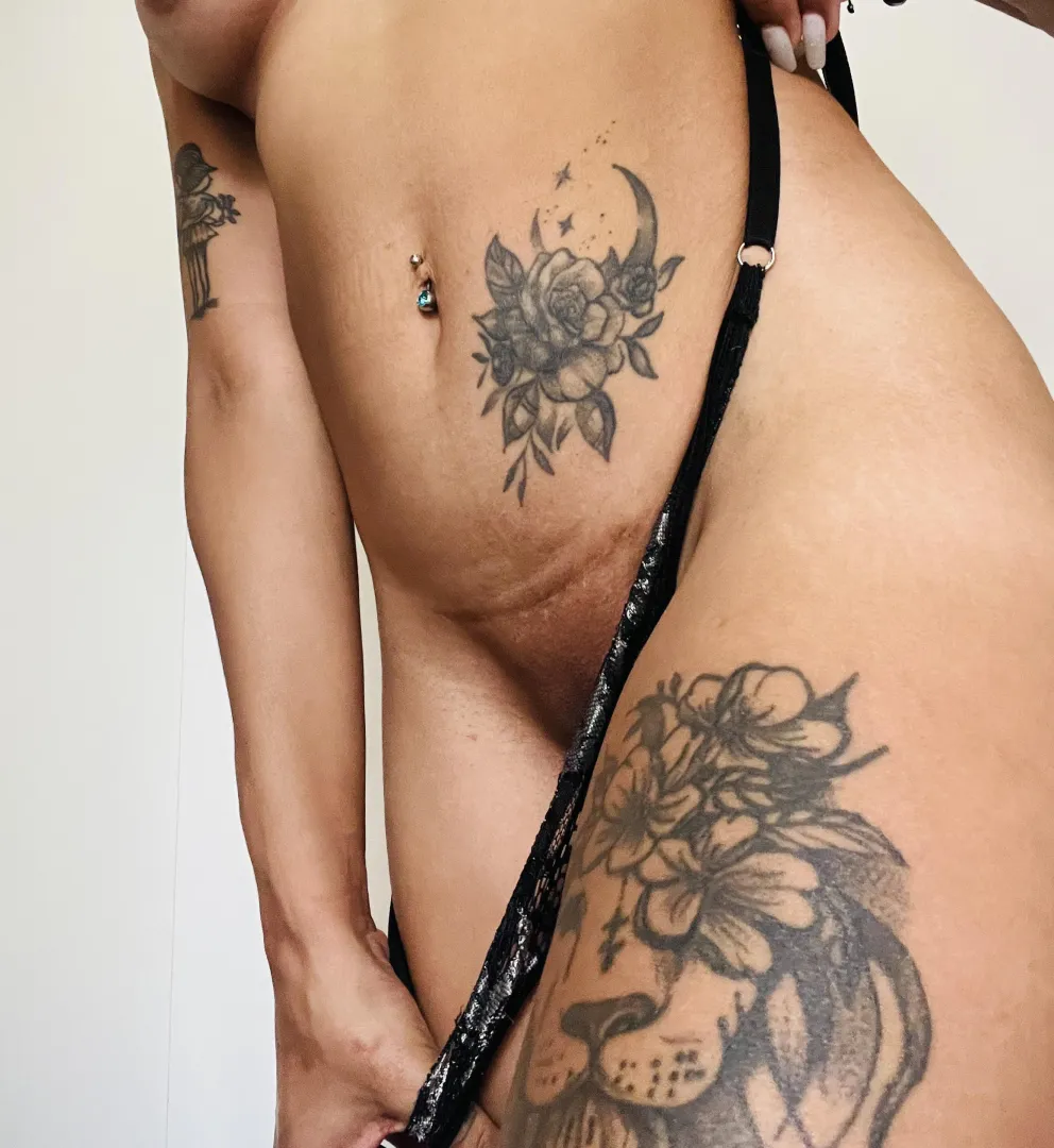 tattooed and horny Latina