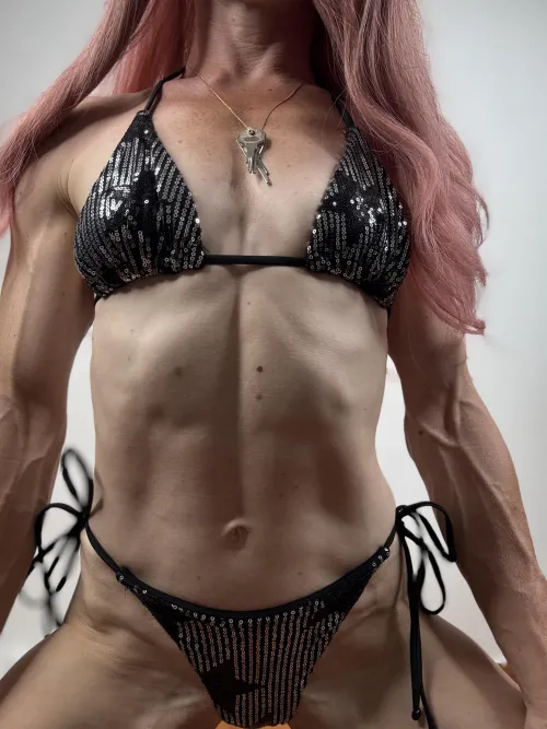 When I flex, you look — especially at these abs and powerful hands.