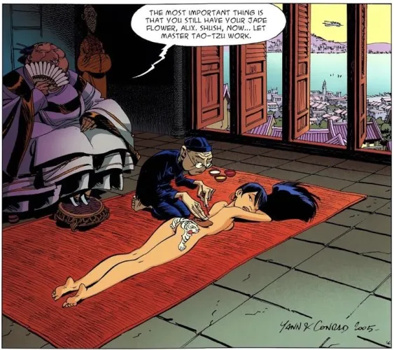 Alix getting her Plot tattooed [“White Tigress” #2: Peach Skin and Silk Ties /(french): “Tigresse Blanche” Vol 2]