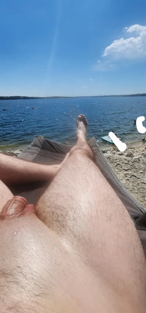 Beautiful day for a tan. The water is so blue.